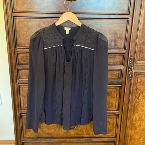 Anthropologie Tops - Anthropologie Tiny black long sleeve top with lace overlay